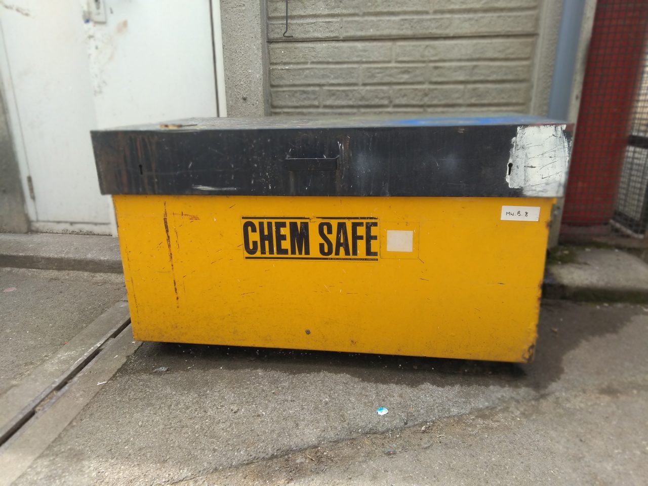Untitled (1 of an edition of 3), chemicals storage container, paper label, paint marks,, h 75cm w 119, d 64.5cm, 2019 NFS
