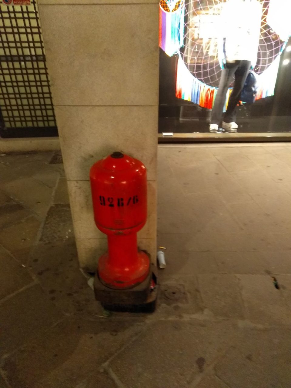 Painted hydrant, glass bottle, plastic tube, cigarette butt, Louis Vuitton store, Venice, 2019, NFS