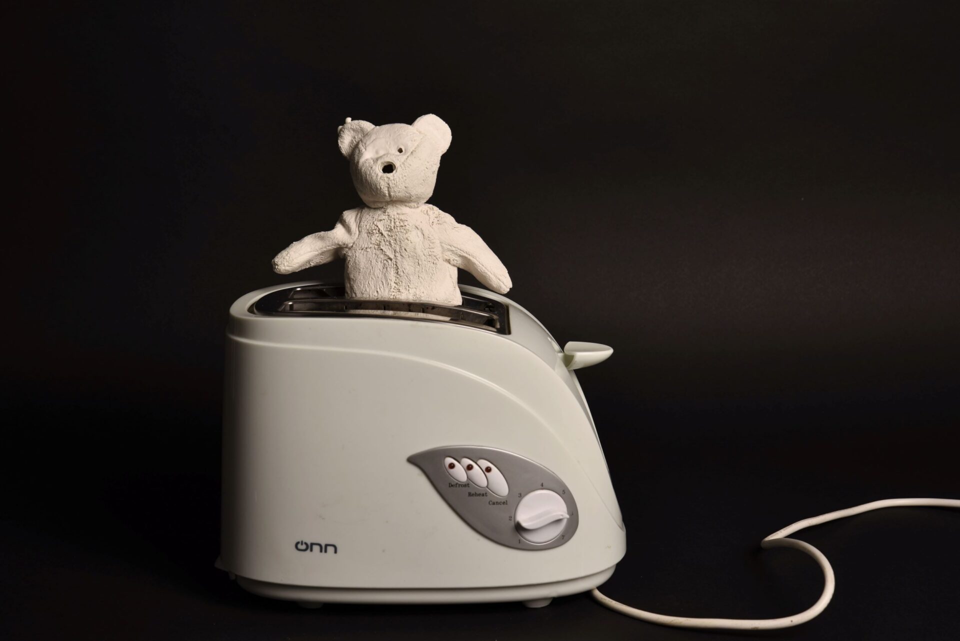Teddy in a toaster I, fired clay slip teddy, ONN toaster, dimensions variable, 2021 POA