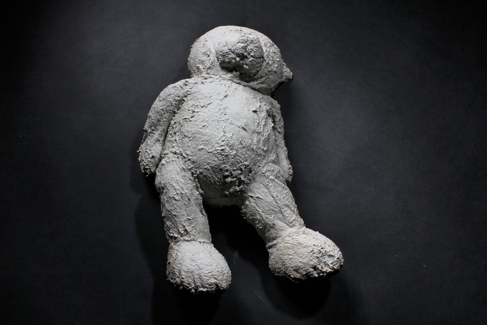 Magna relicta teddy, clay slip, charity shop toy, l 40 x w 23 x h 13 cm, 2022 POA