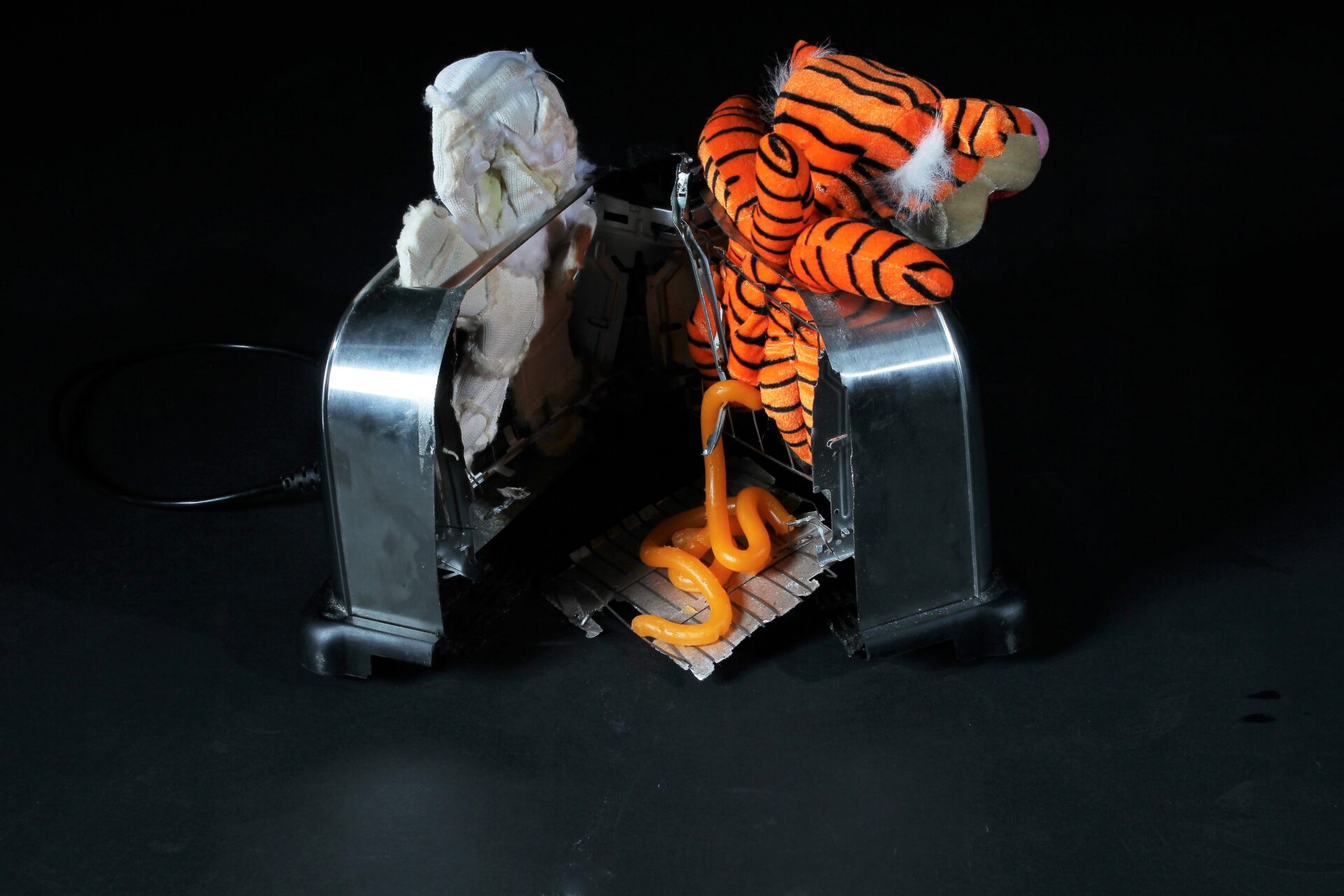 White toast and marmalade, sawn up toaster, charity shop toys, silicone, watercolour, dimensions variable 2022 POA